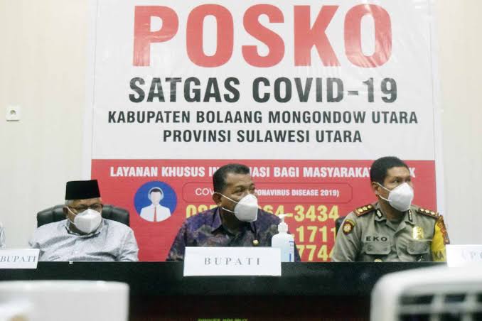 Buat Spanduk 3M, Pemkab Bolmut Ajak Warga Tidak Abai Prokes Protokol Kesehatan